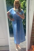 I really like the dress, its a little longer than I thought it would be. I disliked that the belt is attached & the neckline is low. - Christina C.