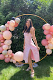 Flowy, airy dress. Pretty straps and bust, but the bust doesn't have a ton of support. There's a sparkle to the material not shown on the website. The dress is very pretty, and the slit is perfect but depending on which way you pose, the dress can look like it gives you no shape, so just be aware. - Jenna L.