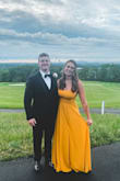 This dress fit me so well and I was so comfortable in it all evening! I wore it to a wedding and could dance without feeling like I kept having to fix it. I wore a strapless, backless sticky bra and that evened out the top. I also had a tailor take a tiny bit of length off the bottom because it was a tad long on me and had him put a little hidden snap so that I could snap the slit closed when it was windy (but you could get away with not doing that too!) I would recommend this dress to anyone and am so glad I bought it! - Kristina V.