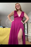 The magenta color is stunning! I'm tall and curvy. I ordered a size large and it fits perfectly around my waist and long enough to wear heels as a 5'9 gal. I have a smaller chest and this dress is a little roomy around the bust but I only need fashion tape to keep it down. - Ciara L.