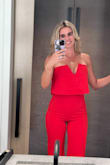 This jumpsuit fit absolutely perfectly! I did not have to pull the top up constantly, everything stayed in place. I received multiple compliments and highly recommend! - Mariah F.