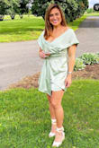 Absolutely loved this dress. Wore it to a wedding and got a ton of compliments. I had ordered a Medium but had issues with the zipper. Exchanged for a Large and same issues with the zipper. It just always stuck. I did take it to a tailor to get that front asymmetrical piece cut slightly shorter, it was just longer than needed. I wore it up on my shoulders a bit rather than off shoulder, just finds this is better for my frame. I definitely stood out in this dress and can't wait to wear it again. - Lindsey S.