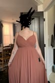 This was a beautiful dress and covered my giant boobs well. The dress is heavy. The layers are heavy. It wasn't a good fit for the weather of the location I'm at. Too hot. - Katlyn K.