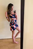 This set is adorable! It looks exactly how it does on the model and the material is great. My only complaint is that the zipper on the top zips only about 3/4 of the way up, so it's a little difficult to remove over my shoulders/hips, especially since the material has no stretch. But other than that, I love it! And it's definitely worth the slight struggle to remove and put on. Get it! - Crystal B.
