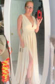 This dress is perfect!! 
Fit to the size they adviced me (small)
The material of the dress is a very good quality. - Myriam B.