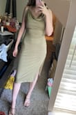 I love this dress! I bought it for a wedding I will be going to in the summer. Some of the reviews worried me about fit but I love the cowl neckline and the slit. I have no problems with the strap staying on. The fabric is stretchy and I probably could've sized down for a tighter fit. One of my favorite things is that I can wear a strapless bra with the dress because I hate sticky boobs and nipple covers. - Taryn C.