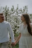 I wore this dress for my engagement shoot. I thought it was a perfect folk-style dress and loved how it looked. I received a lot of compliments too! I normally wear a S but I read that this dress ran small so I ordered a M and am glad I did. It was a good fit! - Mackenzie C.