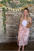 I wore this skirt for my bridal shower and loved it! The only thing is since it's a wrap skirt it was a little difficult sitting in a chair and opening presents as it was falling open. - Emily M.