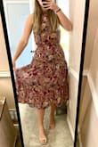 I ordered this dress for a wedding I am going to next week and its perfect! I was nervous about the neck or chest area being too tight but have the perfect amount of extra space to where its not baggy at all. I didn't realize the top most portion of the dress was a little sheer but you cant see a bra through it. Length hits me a tad below where it hits the model but still love it. So flowy but still flattering. Also is underlined! Lighting is dark in photo, so i attached a pic in natural light, beautiful colors. - Emily K.