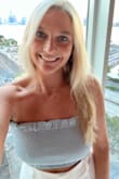 Love the color and material. Stays up well with or without bra. - Christa C.