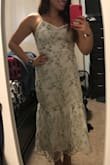 This dress is absolutely beautiful! It is perfect for my engagement photos. I am normally a size small or medium with clothes, but I decided to size up for a more comfortable fit with my stomach and I'm glad I did. I ordered a size Large. - Mariah G.