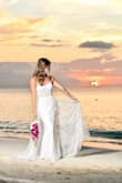 This dress was perfect for our tropical beach wedding! It is light, airy and flowy and fit like a glove. The train on the back is fun and perfect for pictures. Love it and woud definitely recommend. - Lauren B.