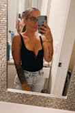 I feel most confident in a black bodysuit&jeans. Basic but so cute and can be dressed up or down. I wore this for a girls night and felt so good! I ended up going with XS since I wasn't wearing a bra and wanted to be held in extra tight but S would have also been perfect. - Bianca B.