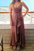 This dress is gorgeous and looks exactly as pictured. My only issue was I felt it was too low in the front; but that was an easy fix with a small safety pin. I wore it to a wedding and got many compliments. Highly recommend! - Kathryn B.