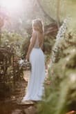 I have had this dress hanging in my closet for a year!!! And I finally wore it on my wedding day. It was so lovely. The quality is amazing, it looks way more expensive than it is. I did not want to spend a fortune on the dress I would wear for a few hours, but still wanted to look amazing. I was searching for a romantic, simple but still a bit festive, summer wedding dress. This was perfect. I took out the cups because it looked to big on me and wore it with nipples. Just perfect. The dress shimmers in the sunlight and photographs amazingly. Are there more amazing wedding dresses out there? Probably yes. But if you want something beautifully made, summery and not over the top and with very reasonable price. Look no further!!! - SPELA Z.