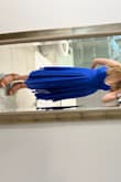 It had 3 mini holes in the front which sucked but it was too late for me to ship it back because I had an event! But overall loved the color and how it fit!! - Valentina M.