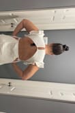 Love the dress, super cute & flattering. Material is not so see-through. I had an issue with the top. If I would have sized up the whole dress would be entirely too small so I stuck with a L. However the buttons were super tight in the back if you have broad shoulders. Not for big-chested girls. - Adrian