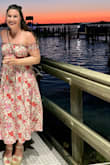 This dress is fun to wear and flattering. The colors pop in the sun and the slits on both sides make it more interesting. Perfect for a summer night out. - Maria C.