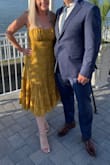This dress is absolutely lovely. Great color, fits comfortably and the adjustable straps are perfect. Wore it to a wedding recently and got lots of compliments. - Alyssa T.