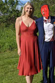 Such a great quality dress. A perfect burnt orange/terracotta. Was the right choice for a beach wedding! the ties in the back are...... challenging.. but once you have someone with patience to help, it's great! You can adjust the tightness which I loved. - Brittany B.