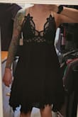It's gorgeous! I was hesitant to buy it cause of the price but it's so worth it and fits perfectly! Only 4 starts cause it is a little see through in certain lighting, I wish the material on the bottom half of the dress was thicker. But I'll just wear shorts underneath! - Alexa G.