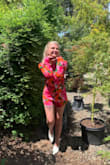 Everything about this romper is PERFECT. It's so bright and both sexy and cute at the same time with the low back. Get one in every color if you can! - Barbie H.