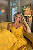 Love this dress the fabric and color are really beautiful. It flows nice and can be made fancy or casual - Julie H.