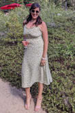 This dress fit me like a glove and I got so many compliments! It hugged in all the right places too. My bust is actually 36g (not an option) so it was a bit tight there than other parts of the dress and I could not wear a bra under; it kinda bisected my bust but I think the next size up would have been too big. I will definitely wear this dress again. - Adrienne G.