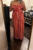 I saw a bunch of reviews saying the fit was large but opted for my usual Lulu's size anyway (XL) as sometimes I find that advice doesn't apply to me. Boy was I wrong! The pants were wayyyy too long. It kind of just looked like a bag on me at first and I considered returning. But after I hemmed the pants (took off about 4 inches), *chef's kiss*. It changed the look of the whole jumpsuit and now I'm excited to wear. Fabric is thin too for summer so won't be hot. Size down! Took off a star because of the extra labor to hem the pants, which you'll probably have to do too unless you have really, really long legs. - Mesha S.