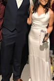 I wore this for my wedding reception and loved it! It was comfortable and stayed put throughout the night even with all of the dancing. I'm 5'2" and the fit was a little long, but nothing a little wedge couldn't fix! - Alyssa A.