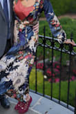 I thought this was beautiful and very comfortable to wear. My one mistake was thinking I could buy a small and pin the top closed but I didn't have enough fabric. Should have ordered a bigger size, didn't have time to exchange it, and ended up buying a camisole to go underneath which was fine. If you've got a bigger bust like me (DD) I would go with a medium at least, probably won't make a difference in how the rest of the dress fits since it's a wrap. Other than that I love it. - Elizabeth B.