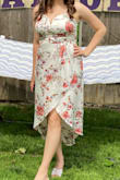 I wore this to my wedding shower and got compliments all day on my dress! I am usually a medium (8/10) but the large fit me perfectly. Definitely order a size up. Some of the other Lulus dresses I tried didn't have enough room in the bust, but this one offered the best coverage. I also liked that this had a zipper in the back, not an intricate tie/wrap system like other Lulus dresses! Very cute and comfortable, highly recommend! - Lauren M.