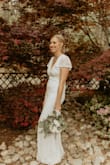My husband and I had a micro wedding in April and this dress was perfect! I felt like a million bucks wearing this dress and it was so comfortable. I got a tone of compliments and questions on this dress also. With 3 inch heels I did not have to hem the dress at all and it hit perfectly at the ground. Since our wedding was outdoors however the bottom of the dress collected all of the pine straw, mulch and other items in the ground. Would definitely purchase again!! - Kali A.
