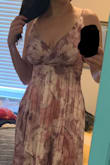 Beautiful flowing fabric makes you feel fancy and fun. This dress was a little outside my comfort zone as I had to find a stick-on bra and the straps don't offer a lot of support for a larger chest. They only adjust so far without pulling on your shoulders. I had to wear heels due to the length in the back but I enjoyed wearing this and had many compliments. - Frances L.