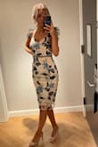 I ordered an XS for a welcome dinner for a wedding in NYC. When I first tried on this dress, I wasn't in love because it was pretty big in the waist and stomach area and the straps were way too long. I got it tailored though and absolutely love it now! People kept coming up to me telling me how beautiful and unique it was. I definitely recommend getting this. - Katherine E.