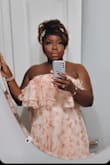 This dress is so soft, so feminine, so pretty but definitely not for us big-boobed gyals. I'm a 38 H for reference, so while it fit my body,  I needed to add more fabric in the boob area. So I bought another dress and took it to my seamstress who did an amazing job with the alterations. I wore this to my birthday brunch and everyone! - Adebola A.