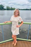 This dress is absolutely perfect! I wore it for my bridal shower and received so many compliments. It's also very flattering and isn't too short. Would 10/10 recommend! Typically, I would order a medium, but I read prior reviews and went with a small and it fit perfectly! - Amanda B.