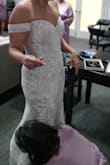 I originally bought my wedding dress 2 months after having my son and loved it. As I lost weight and had it altered I hated the way it fit me SO I bought this dress on a whim maybe 3 weeks before my wedding? It fit me like a glove with no alterations needed! Everyone complimented me on it and it was very comfortable. - Katie B.