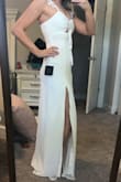I purchased this for the welcome party I'm hosting the day before our wedding, it fits my body perfectly and the cutout makes it sexy but still classy!  The straps are a little loose even tightened all the way (I am very small busted so that's probably why) but that will be an easy alteration. Length is perfect with a small 2" heel. - Rebecca P.