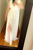 The material is high quality, I have returned a couple due to buying the wrong size( which was on me cause I didn't bother measuring myself) & the returning process and customer service was great. I'm wearing this dress for my outdoor wedding. I love lulus and would recommend 100 times over. Also sorry for the braless photos - Erin F.