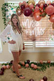 This romper fits like a dream. The XS was not too tight or too short, and I love the buttons on the sleeves. The neckline does dip lower than the photo shows, but I love that too! - Jenna L.