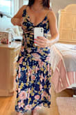 This dress is gorgeous but not true to size. The top is extremely small but I have so much room in the waist and hips. I ordered a large and I'm not a large by any stretch of the imagination. I hope it fits when it comes because I need it for a wedding! - Celeste A.