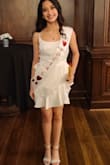 It's a nice satin, nice fitted dress. My daughter wore it too her school banquet. - Brandi H.