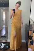 Soft material. On the long side, would either need to be hemmed or wear with heels. Only returning due to a missing button but very cute. - Jordan S.
