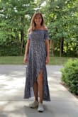 I really like this dress! It's fun wearing with white tennis shoes but probably would look better with sandals. Wore to work today with the sleeves up (I work in healthcare) and then pulled the sleeves off my shoulder for dinner out tonight!  #lovelulus - Laura H.