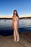 I bought this to wear as a bridesmaid in a wedding. I received so many compliments. The fabric is great and the color was perfect. I was very happy with this purchase. - Kelly W.