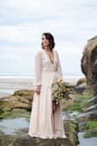 Bought this dress for our elopement. Ran a little large for my chest but everywhere else was super flattering. I used double-sided tape to keep the girls in check. The sleeves are gorgeous. I don't usually review but I felt so pretty and I wanted to show it off - Blair S.