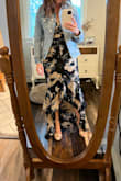 I'm 5 feet tall, it dragged a little in the back with my heels on, but nothing major. I'm used to hemming my dresses, but didn't with this one. It worked. It's a little snug in the rib cage, but I wouldn't have sized up. Everywhere else fit good. I dressed it down with a jean jacket for a wedding shower. The straps are adjustable which is always nice. Got lots of compliments. - Michelle