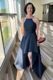 I needed a new dress last minute for a blue tie gala that I was invited to with some girlfriends. This dress was delivered quickly and worked perfectly for the gala and I received lots of compliments which was flattering!! The quality and texture of the material are amazing and I loved that it had two nice deep pockets which were perfect to hold my phone and car key so I didn't need a purse. It had lots of creases in it from being folded and shipped in plastic but all the wrinkles came out easily after ironing. I also really love this style of dress with it short in the front and long in the back. I am pretty short and the back was a little long even with heels on, but I didn't feel like it was in the way or that I would trip on it. I highly recommend this dress and can't wait to wear it again!!! - Tari T.