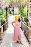 The dress is beautiful.  A perfect shade of pink and was very flattering.  Since I am only 4 ft 8 inches,  I was worring that it might be too long, but it was beautiful on me.  The only problem I had was the opening on my chest, but it was a quick fix with a safety pin.  Wore it to my birthday lunch, my wedding anniversary photo shoot and even shopping at the mall.  I may have to order more in different colors. - Chua X.